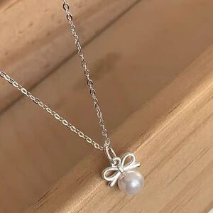 Sterling Silver Bow Pearl Necklace - Elegant and Timeless